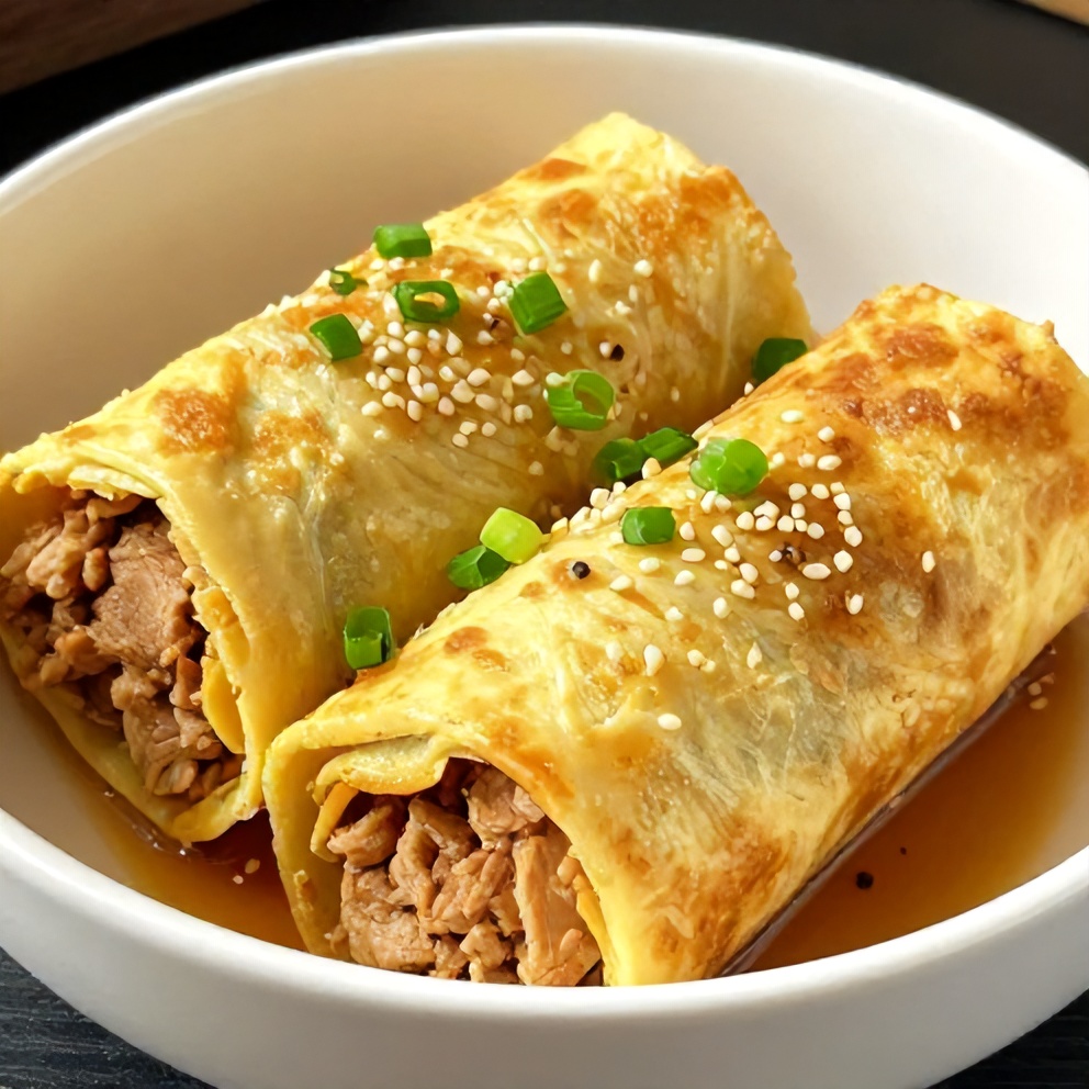 Finished ground turkey egg roll in a bowl on a plate