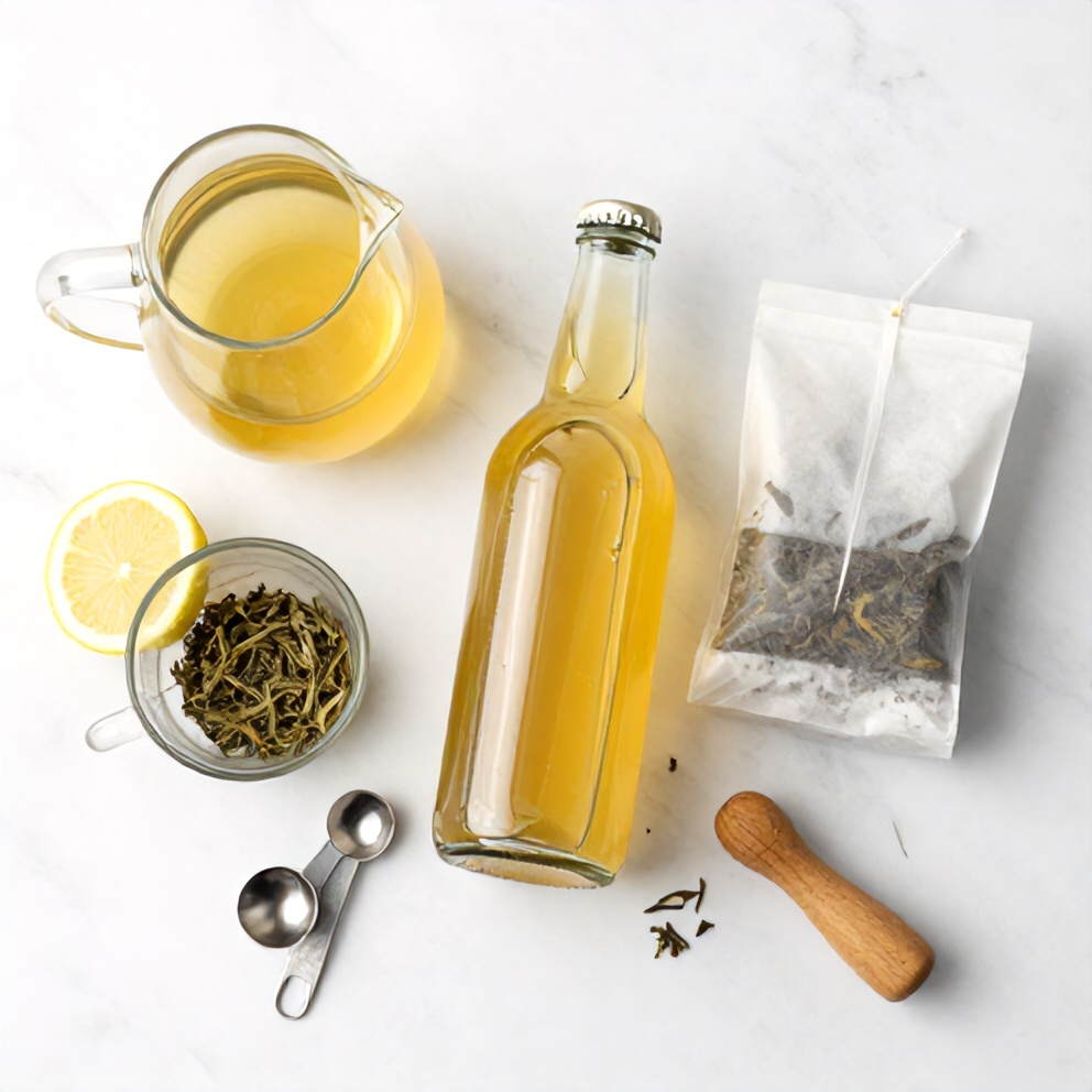 Raw ingredients for Guava White Tea Lemonade on a marble surface