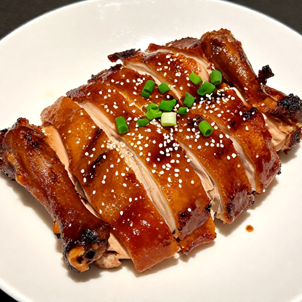 Plated Easy Sticky Char Siu Chicken with green onions
